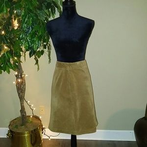 Corduroy, tan skirt.